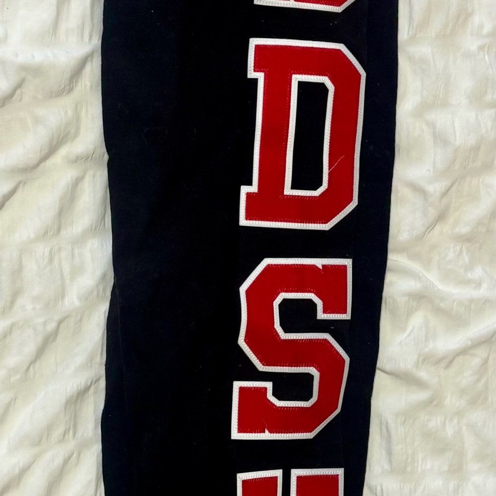 Black Joggers with Red Lettering